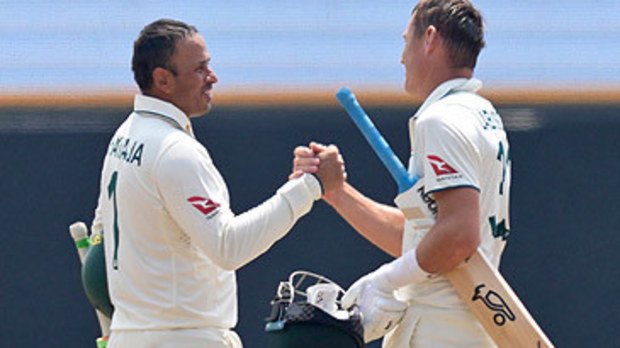 Usman Khawaja and Marnus Labuschagne celebrate winning second Test in Sri Lanka (Eranga Jayawardena/AP)
