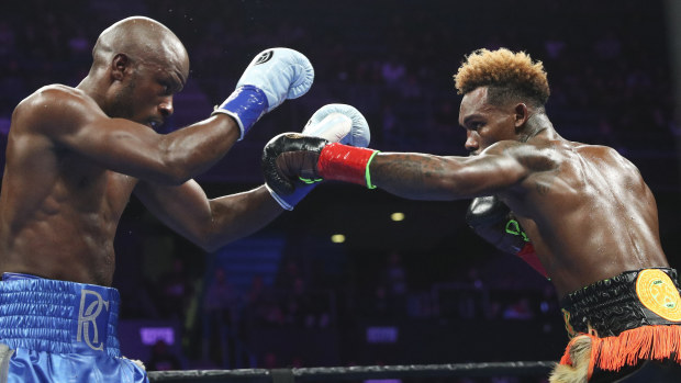 Jermell Charlo (right) fights Tony Harrison for the WBC World Super Welterweight Championship in 2019.