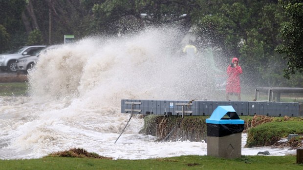 People out looking at the effects of Cyclone Gabrielle at Mathesons Bay Beach on the Matakana Coast on February 13 in Auckland, New Zealand. 