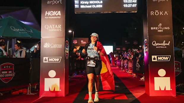 First Nations and TRIMOB athlete Kirsty Nichols crosses the finish line at IRONMAN Cairns.