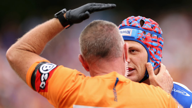 SYDNEY, AUSTRALIA - MARCH 12: Kalyn Ponga of the Knights leaves the field for an HIA during the round two NRL match between Wests Tigers and Newcastle Knights at Leichhardt Oval on March 12, 2023 in Sydney, Australia. (Photo by Cameron Spencer/Getty Images)