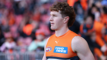 Tom Green of the Giants walks onto the field during the round 14 AFL match between Greater Western Sydney Giants and Port Adelaide.