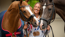 Charlotte Dujardin with her Tokyo 2020 Olympic winning horse Gio, left, and former Olympic gold medal winner Valegro, right, in the stable yard at Oaklebrook Mill, Gloucester. Picture date: Monday August 2, 2021. (Photo by Ben Birchall/PA Images via Getty Images)