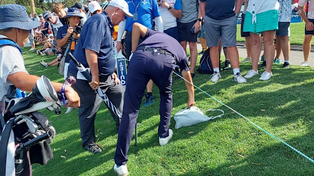Rikuya Hoshino's ball lies underneath women's bag at the Australian Open.