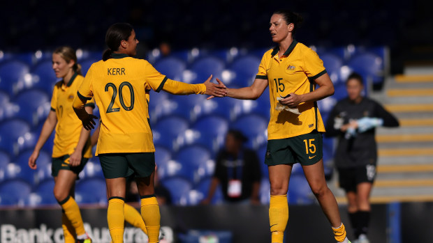 Sam Kerr and Emily Gielnik of Australia interact during the International Friendly match between CommBank Matildas and South Africa Women at Kingsmeadow on October 08, 2022 in Kingston upon Thames, England. (Photo by Paul Harding/Getty Images)