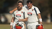 MELBOURNE, AUSTRALIA - MARCH 09: Jake Lehmann of South Australia and Ben Manenti of South Australia embrace after winning the Sheffield Shield match between Victoria and South Australia at CitiPower Centre, on March 09, 2025, in Melbourne, Australia. (Photo by Daniel Pockett/Getty Images)