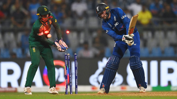 Gus Atkinson of England is bowled for 35 by Keshav Maharaj of South Africa (not pictured) during the ICC Men's Cricket World Cup India 2023 match between England and South Africa at Wankhede Stadium on October 21, 2023 in Mumbai, India. (Photo by Gareth Copley/Getty Images)