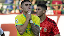 Brazil's Gabriel Pec reacts after missing a chance to score a goal against Argentina.