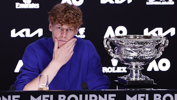 Men's singles champion Jannik Sinner attends a press conference.