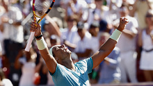 Spain's Rafael Nadal celebrates after winning his semifinal match against Croatia's Duje Ajdukovic in the men's singles Nordea Open in Bastad, Sweden, Saturday July 20, 2024. (Adam Ihse/TT News Agency via AP)