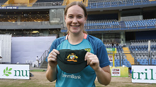 MUMBAI, INDIA - DECEMBER 21: Lauren Cheatle of Australia poses with her debut cap at the start of day one of the Women's Test Match between India and Australia at Wankhede Stadium on December 21, 2023 in Mumbai, India. (Photo by Pankaj Nangia/Getty Images)