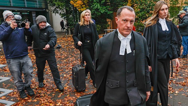 Erin Patterson's legal team leave the court, led by Colin Mandy SC.