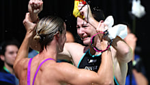 BRISBANE, AUSTRALIA - JUNE 15: Cate Campbell of Queensland is hugged by her sister Bronte Campbell of Queensland after competing in the Womens 50m Freestyle Final during the 2024 Australian Swimming Trials at Brisbane Aquatic Centre on June 15, 2024 in Brisbane, Australia. (Photo by Quinn Rooney/Getty Images)