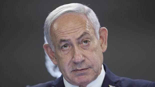 Israeli Prime Minister Benjamin Netanyahu speaks during a press conference at the Prime minister's office in Jerusalem, Sunday, Aug. 10, 2025. (Abir Sultan/Pool Photo via AP)