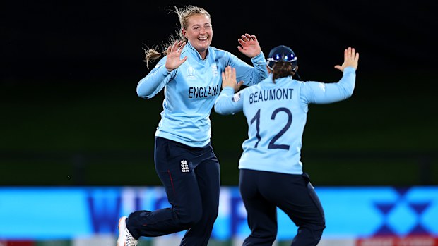 England's Sophie Ecclestone celebrates with Tammy Beaumont after taking her sixth wicket during the Women's Cricket World Cup semi final.