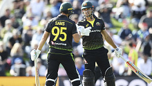 Australia's Daniel Sams, left, teammate Marcus Stoinis react during the second T20 cricket international between Australia and New Zealand.