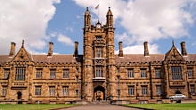 The main quadrangle building of the University of Sydney, seen from the front lawns. Established in 1850, the university is the oldest in Australia and Oceania.