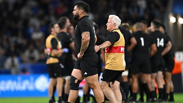 Tyrel Lomax of New Zealand  leaves the field dejected after receiving medical treatment.