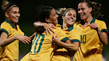 Sam Kerr of the Matildas celebrates with team mates after scoring a goal during the international women's friendly match between the Australian Matildas and Vietnam in 2015.