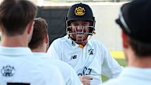 Corey Rocchiccioli celebrates with team mates.