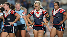 Roosters players react to a Sharks try during their NRLW preliminary final.