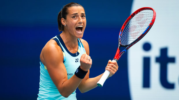 Caroline Garcia reacts to defeating Coco Gauff at the Miami Open.