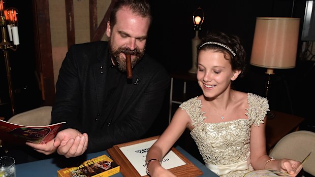 David Harbour and Millie Bobby Brown at Mack Sennett Studios on July 11, 2016 in Los Angeles, California.