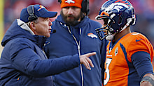 DENVER, COLORADO - OCTOBER 29: Russell Wilson #3 of the Denver Broncos talks with head coach Sean Payton of the Denver Broncos during the fourth quarter of a game against the Kansas City Chiefs at Empower Field At Mile High on October 29, 2023 in Denver, Colorado. (Photo by Justin Edmonds/Getty Images)