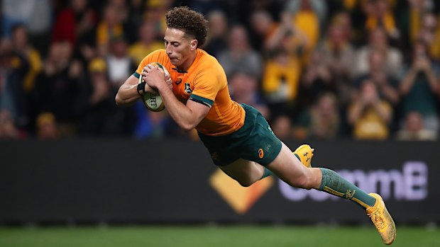 Mark Nawaqanitawase of the Wallabies scores a try.