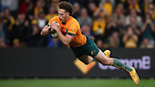 Mark Nawaqanitawase of the Wallabies scores a try.