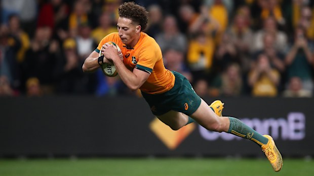 Mark Nawaqanitawase of the Wallabies scores a try.