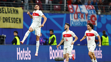 Merih Demiral of Turkey celebrates their first goal during the UEFA EURO round of 16 match between Austria and Turkey at Football Stadium Leipzig.