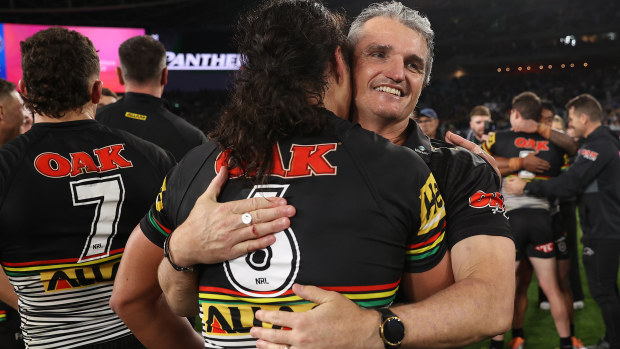 SYDNEY, AUSTRALIA - OCTOBER 02: Jarome Luai of the Panthers and Panthers coach Ivan Cleary embrace as they celebrate victory in the 2022 NRL Grand Final match between the Penrith Panthers and the Parramatta Eels at Accor Stadium on October 02, 2022, in Sydney, Australia. (Photo by Mark Kolbe/Getty Images)