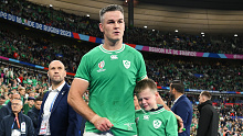Johnny Sexton consoles his son after Ireland lost to New Zealand in the quarter-final.