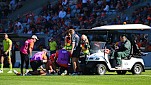 Sam Taylor receives medical attention during the round five AFL match between the GWS Giants and the St Kilda Saints.