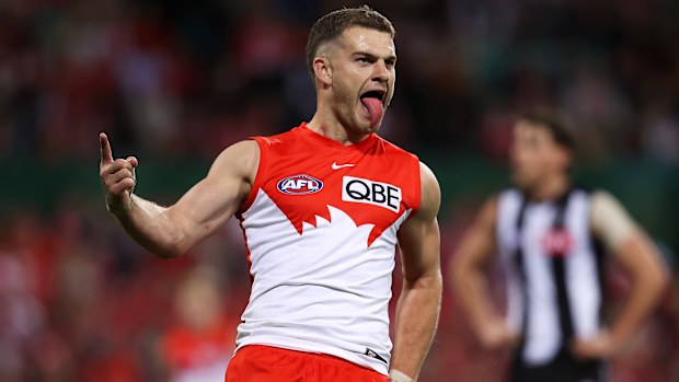 Tom Papley of the Swans celebrates kicking a goal.