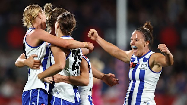 Emma Kearney celebrates with teammates.