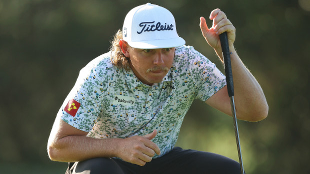 Cameron Smith of Australia lines up a putt.