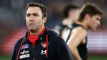 MELBOURNE, AUSTRALIA - AUGUST 25: Brad Scott, Senior Coach of the Bombers looks on during the 2023 AFL Round 24 match between the Essendon Bombers and the Collingwood Magpies at Melbourne Cricket Ground on August 25, 2023 in Melbourne, Australia. (Photo by Michael Willson/AFL Photos via Getty Images)
