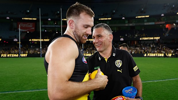 MELBOURNE, AUSTRALIA - APRIL 19: Noah Balta of the Tigers and Adem Yze, Senior Coach of the Tigers celebrates during the 2025 AFL Round 06 match between the Richmond Tigers and the Gold Coast Suns at Marvel Stadium on April 19, 2025 in Melbourne, Australia. (Photo by Michael Willson/AFL Photos via Getty Images)