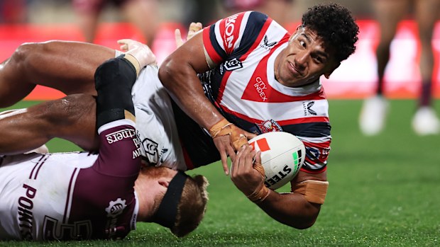 Siua Wong of the Roosters is tackled during the round 23 NRL match between the Sydney Roosters and Manly Sea Eagles at Sydney Cricket Ground on August 03, 2023 in Sydney, Australia. (Photo by Matt King/Getty Images)