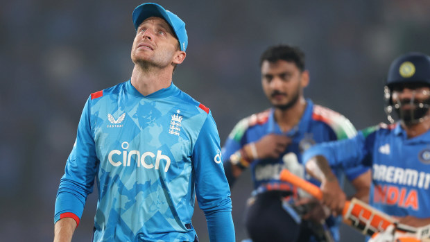 England captain Jos Buttler walks off the field.