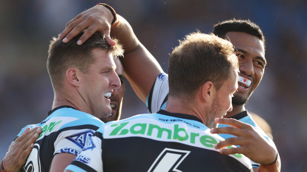 SYDNEY, AUSTRALIA - FEBRUARY 19: Teig Wilton of the Sharks celebrates scoring a try during the NRL Trial Match between the Canterbury Bulldogs and the Cronulla Sharks at Belmore Sports Ground on February 19, 2023 in Sydney, Australia. (Photo by Mark Metcalfe/Getty Images)