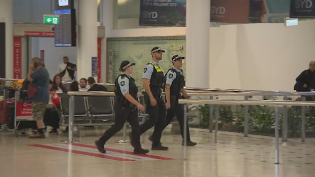 Police arrive at Sydney Airport ahead of arrival of so-called "ISIS brides'.
