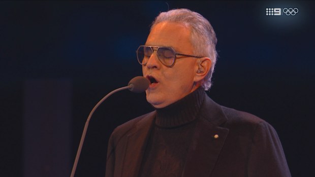 Italian tenor Andrea Borcelli performed as the Olympic flame entered the stadium during the Milano Cortina 2026 Opening Ceremony.