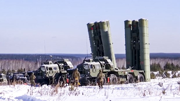 In this photo taken from video and released by the Russian Defense Ministry Press Service on Thursday, Jan. 27, 2022, Russian S-400 Triumf surface-to-air missile systems attend a military drills in Sverdlovsk region, Ural, in Russia