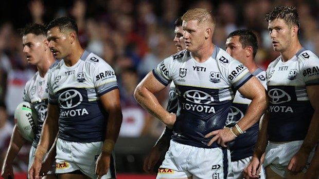Griffine Neame and his Cowboys teammates look stunned during their round-one match against the Sea Eagles.