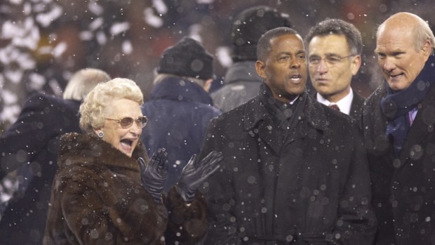 Chicago Bears owner Virginia Halas McCaskey victorious during trophy presentation by former NFL player Tony Dorsett and Fox Sports media announcer Terry Bradshaw after winning game vs New Orleans Saints. Chicago, IL 1/21/2007