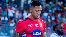 Israel Folau of Tonga bowed out early against Fijian after suffering an injury