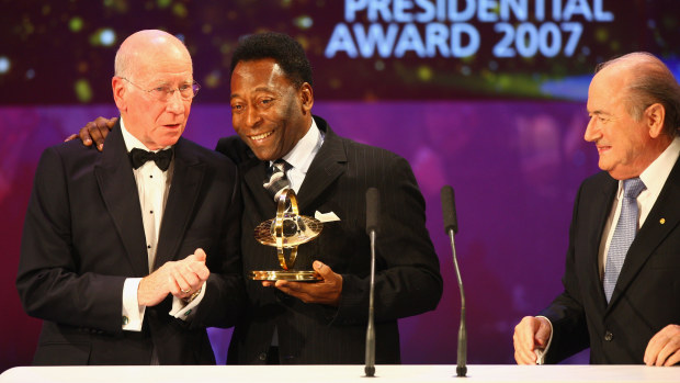 Pele (C) receives the Presidents Award from Sir Bobby Charlton (L) as Fifa President Sepp Blatter looks on during the FIFA World Player of The Year Gala 2007 at the Zurich Opera House on December 17, 2007 in Zurich, Switzerland. (Photo by Michael Steele/Getty Images)